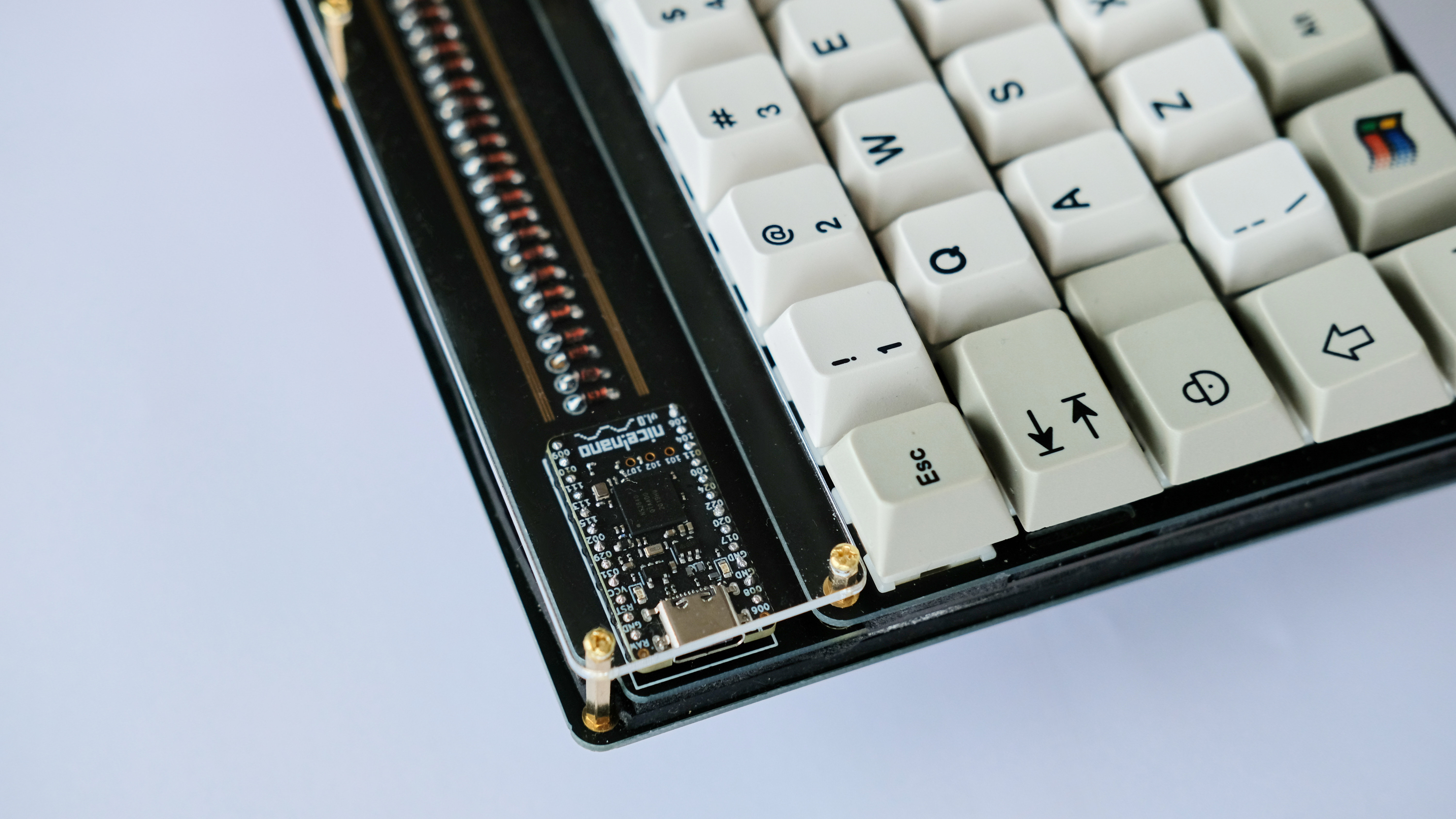 The nice!nano microcontroller on the KBIC65 mechanical keyboard